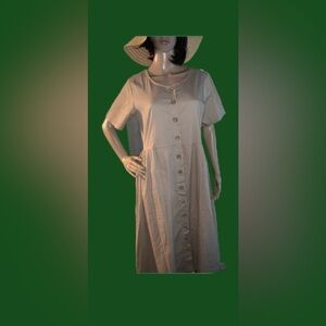 LONG KHAKI DRESS. NWT Size Medium. By Metropolitan. Button-up. Has pockets.